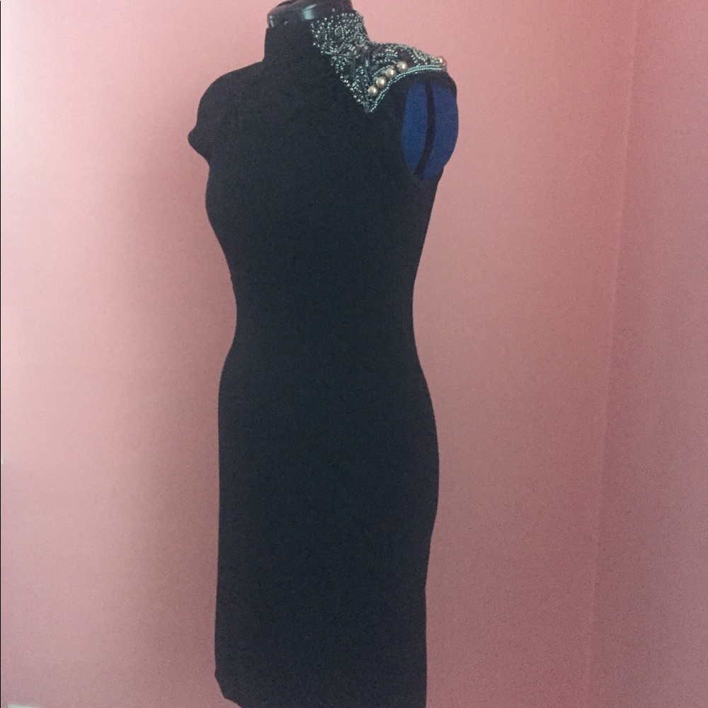 Navy knit cocktail dress with ornate beading